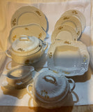 A Set of 79 Piece Exquisite Porcelain  With Gold Roses by Rosenthal.