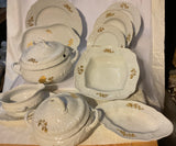 A Set of 79 Piece Exquisite Porcelain  With Gold Roses by Rosenthal.