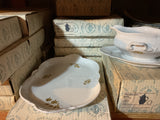 A Set of 79 Piece Exquisite Porcelain  With Gold Roses by Rosenthal.