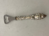 Bottle Opener After an Antique Mythological Pattern.