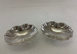 Pair of shell shaped silver plate Sweet dishes on ball feet