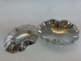 Pair of shell shaped silver plate Sweet dishes on ball feet