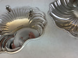 Pair of shell shaped silver plate Sweet dishes on ball feet