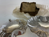 Pair of shell shaped silver plate Sweet dishes on ball feet