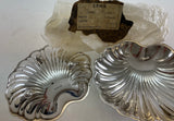 Pair of shell shaped silver plate Sweet dishes on ball feet