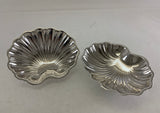 Pair of shell shaped silver plate Sweet dishes on ball feet