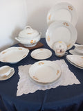 A Set of 79 Piece Exquisite Porcelain  With Gold Roses by Rosenthal.