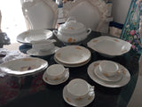 A Set of 79 Piece Exquisite Porcelain  With Gold Roses by Rosenthal.