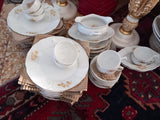 A Set of 79 Piece Exquisite Porcelain  With Gold Roses by Rosenthal.