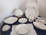 A Set of 79 Piece Exquisite Porcelain  With Gold Roses by Rosenthal.