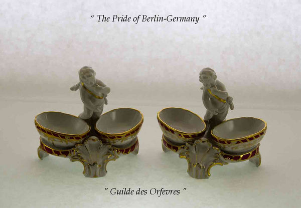 KPM Pair Salt Cellars with Putties Hand-painted with Purple-Red & gold